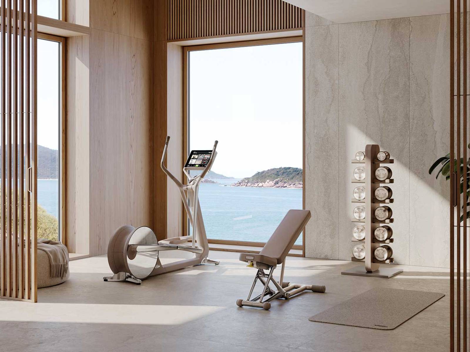 Weniger Studio, mehr Wohnraum: In der Ausführung Sand-Stone verbinden die Fitnessgeräte mineralisch wirkende Flächen mit warmen Metalltönen und Elementen aus Naturmaterialien. TECHNOGYM.