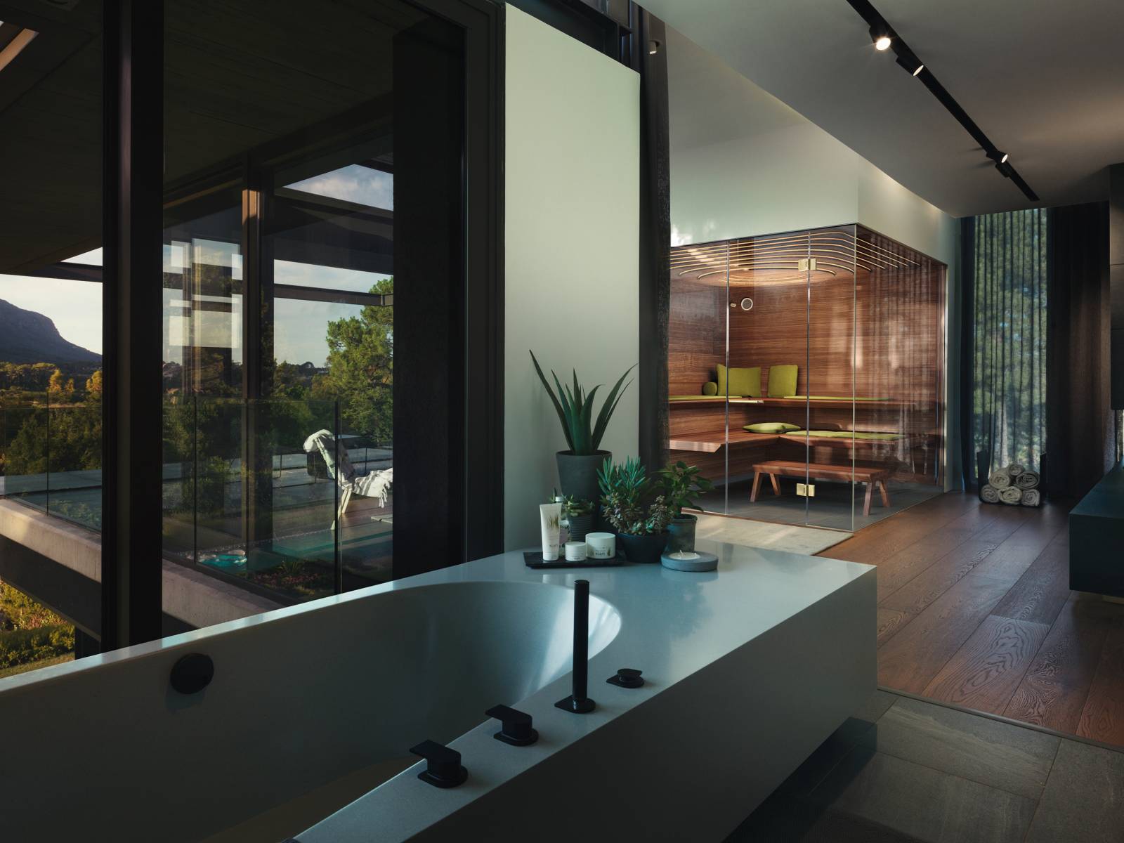 Die römische Göttin der Morgenröte ist Namenspatin dieser luxuriösen Spezialedition. Aurora überzeugt mit edlem Interior aus Nussbaum oder Hemlocktanne, mit schwerelos wirkenden Liegeflächen und komfortablen Saunamatten. Die gewölbte Lichtdecke sowie die zweiseitige Verglasung ohne Rahmen unterstreicht die Schönheit der Innenraumsauna. Klafs.