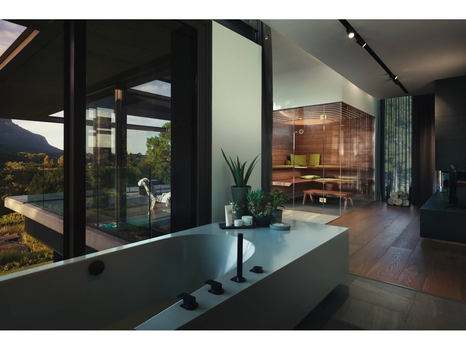 Die römische Göttin der Morgenröte ist Namenspatin dieser luxuriösen Spezialedition. Aurora überzeugt mit edlem Interior aus Nussbaum oder Hemlocktanne, mit schwerelos wirkenden Liegeflächen und komfortablen Saunamatten. Die gewölbte Lichtdecke sowie die zweiseitige Verglasung ohne Rahmen unterstreicht die Schönheit der Innenraumsauna. Klafs.