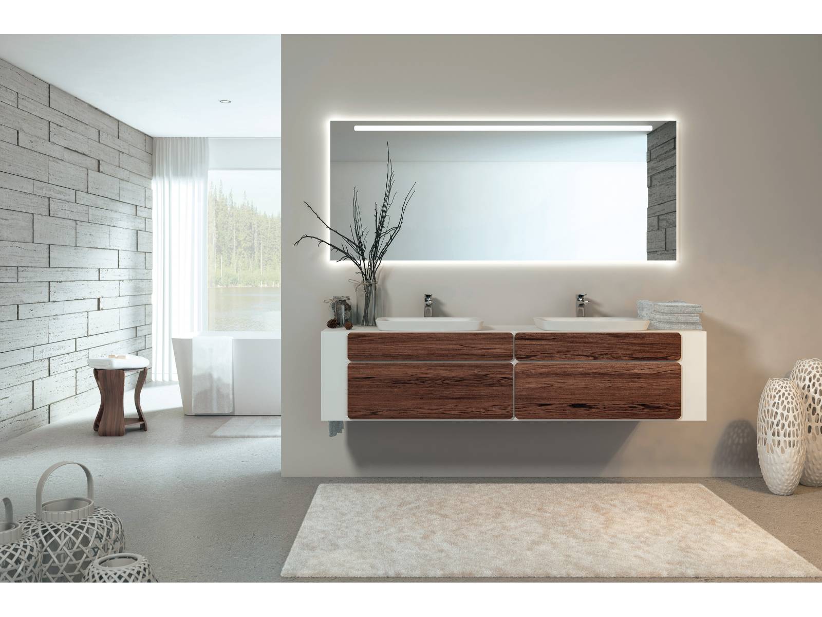 Spieglein, Spieglein an der Wand… Schneewittchens Stiefmutter hätte ihre Freude an den grosszügigen Spiegeln und Spiegelschränken, die mit atmosphärischem, dimmbarem Licht und ausgeklügelten Funktionen ausgestattet sind. Das Intus-Einbausystem ermöglicht ein millimetergenaues Einbauen der Schränke in die Wand. Talsee.