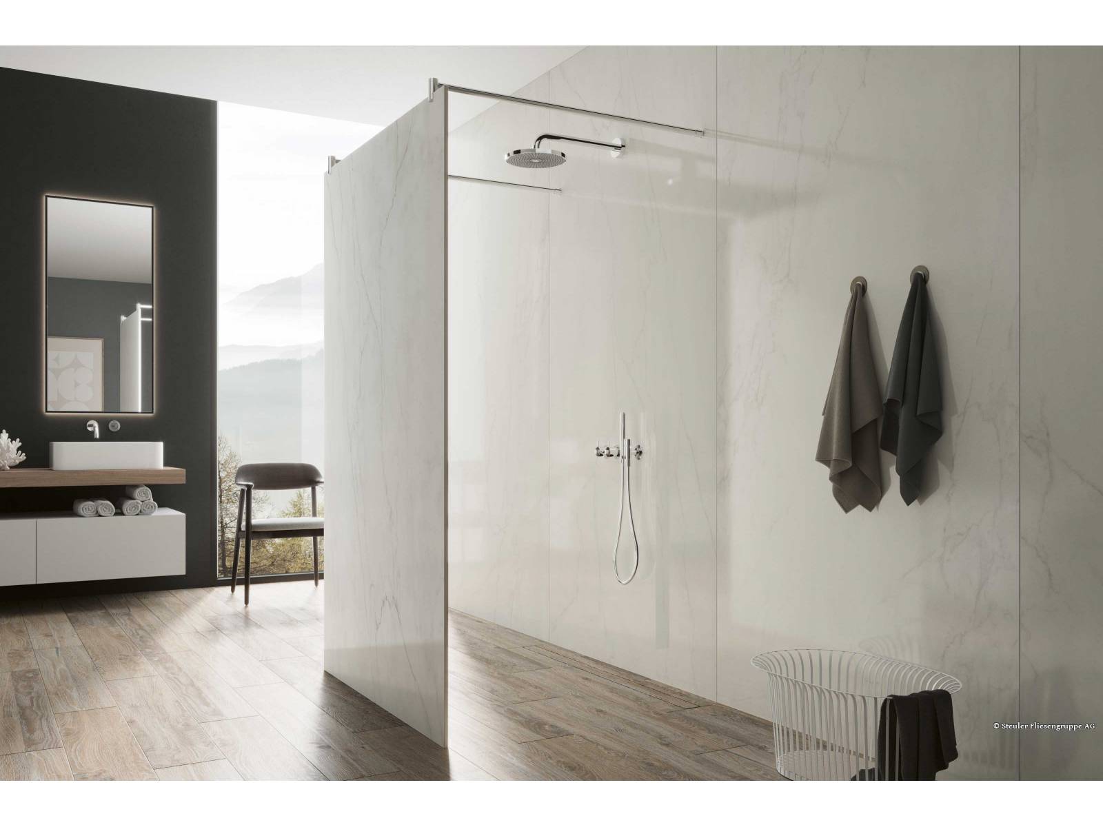 Wenn eine Duschwand alle Blicke auf sich zieht, muss sie etwas Besonderes sein. Bei «Kerbon» ist das der Fall – aufgrund der unterschiedlichen Gestaltung der keramischen Oberflächen auf Vorder- und Rückseite und der Möglichkeit einer Massanfertigung. HGC.