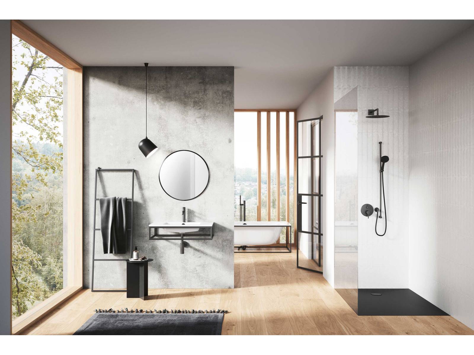 In luftig gestalteten Bädern kommen die Waschtische der Kollektion «Frame» besonders gut zur Geltung, denn die schwarzen Stahlrahmen, die das rechteckige Becken «Mero Frame» oder das leicht gewölbte Becken «Lotus Frame» (im Bild) sanft einfassen, betonen den modernen Industrial-Look. SCHMIDLIN.