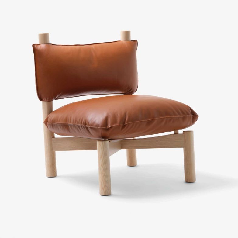 Die neue Lounge-Version des Stuhls «Paf Paf» ist eine Weiterentwicklung des Konzepts «grosse Wolke zum Hineinfallen». Marialaura Irvine kombiniert ein Gestell aus Holz mit einem Polster aus Federn und kleidet letzteres in ein Gewand aus Bouclé, Leder oder Baumwollstoff. mattiazzi.eu