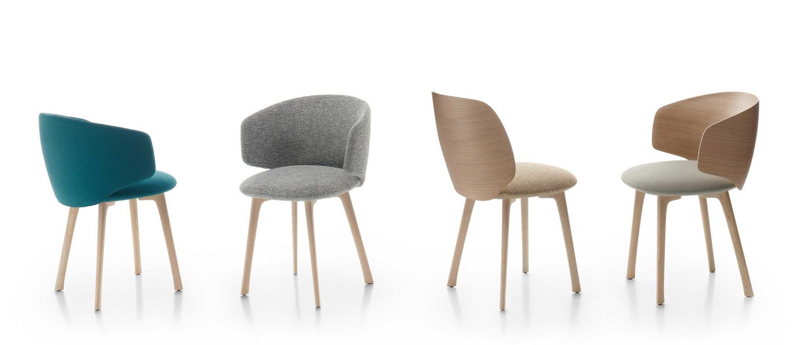 Ein Rückenteil aus gebogenem Holz kennzeichnet die Stuhl-Kollektion «Universal» von Jean-Marie Massaud. Die patentierte Technologie trägt der industriellen Fertigung und der Handwerkskunst gleichermassen Rechnung, was dafür sorgt, dass sich das Möbel ausgesprochen gut sitzt. Aus Holz, gepolstert und mit verschiedenen Fussgestellen erhältlich. Foto: Loernzo Cappellini Baio.