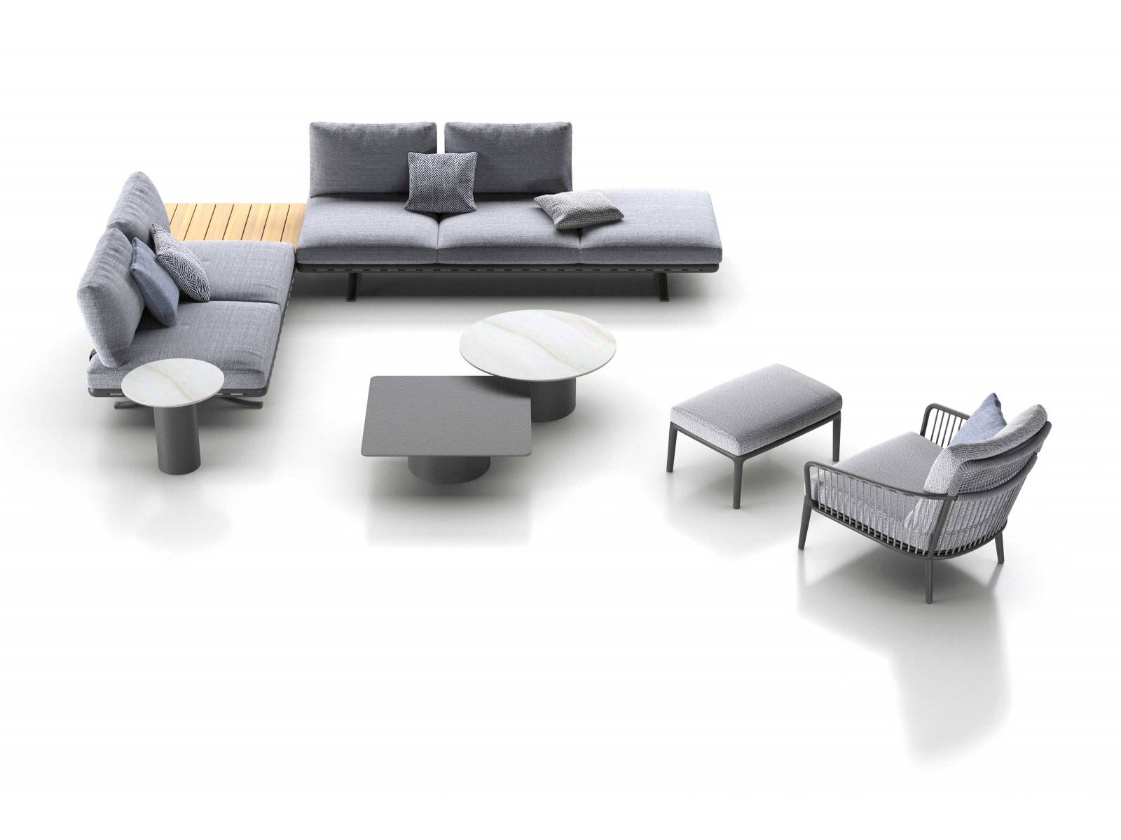 Als erstes Outdoor-Sofaprogramm präsentiert sich Yoko äusserst vielseitig und lässt keine Wünsche offen: Auf einem Sitzrahmen mit Gurtung, Polster, Einlegeplatten sowie umlaufenden Einsteckbügeln lassen sich ganz leicht Sofas, Ecksofas, Recamièren, Liegewiesen oder Vis-à-Vis-Situationen mit und ohne Ablagen gestalten. Design: Toan Nguyen. ROLF BENZ.