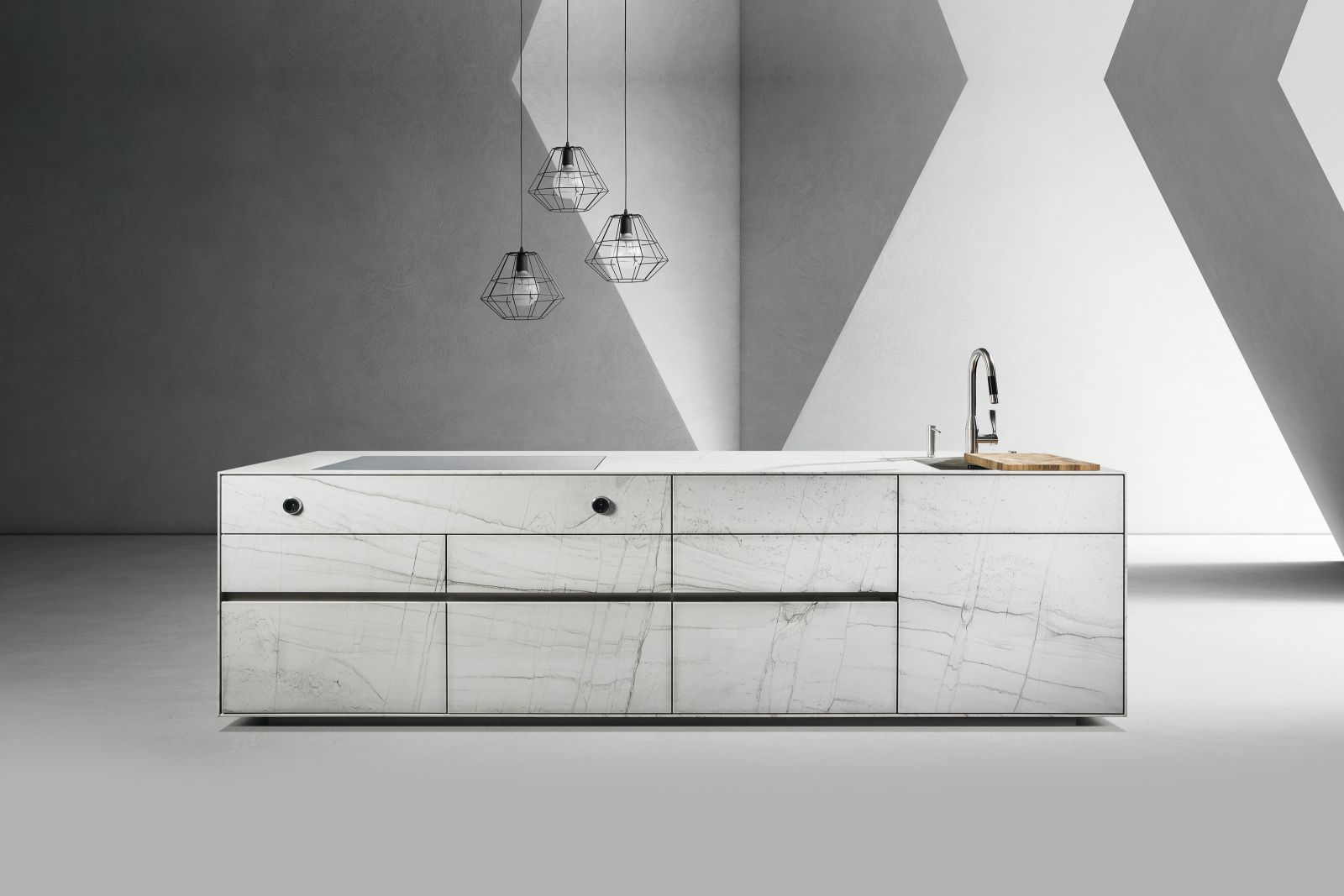 Hans Eisenring: Die Serie der Naturstein-Kücheninsel «St-One» wurde um ein Modell in weissem Quarzit erweitert. Mit ihrer feinen Zeichnung soll die Ausführung Antarctic an eine Gletscherlandschaft erinnern. Die Fronten aus Naturstein, die Schubladen aus Holz und die Schubladenböden aus Echtleder – dieser Luxus ist kaum zu übertreffen. 