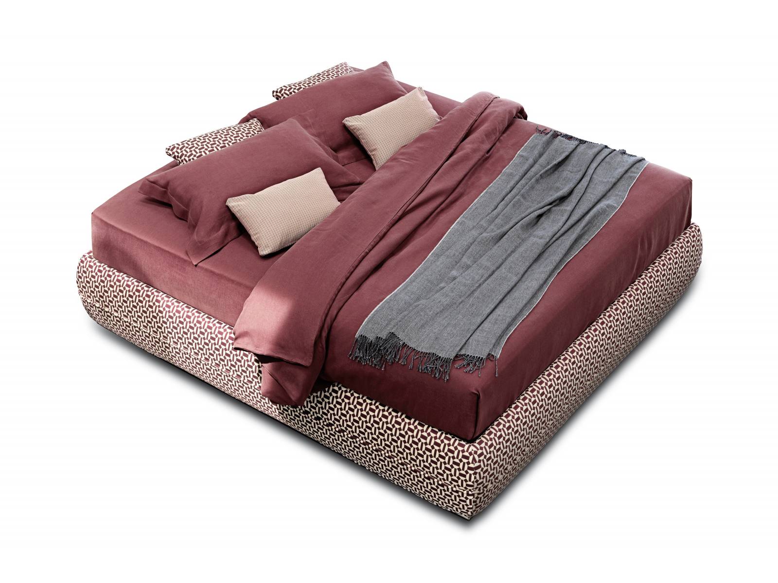 Wie auf einer Insel fühlt man sich auf dem Bett «Mandarine», das mit seinem orientalisch anmutenden Muster ein Blickfang im Raum ist. Für noch mehr Gemütlichkeit gibt es auch ein passendes, hohes Kopfteil dazu. Design: Emanuela Garbin/Mario Dell’Orto. Flou.