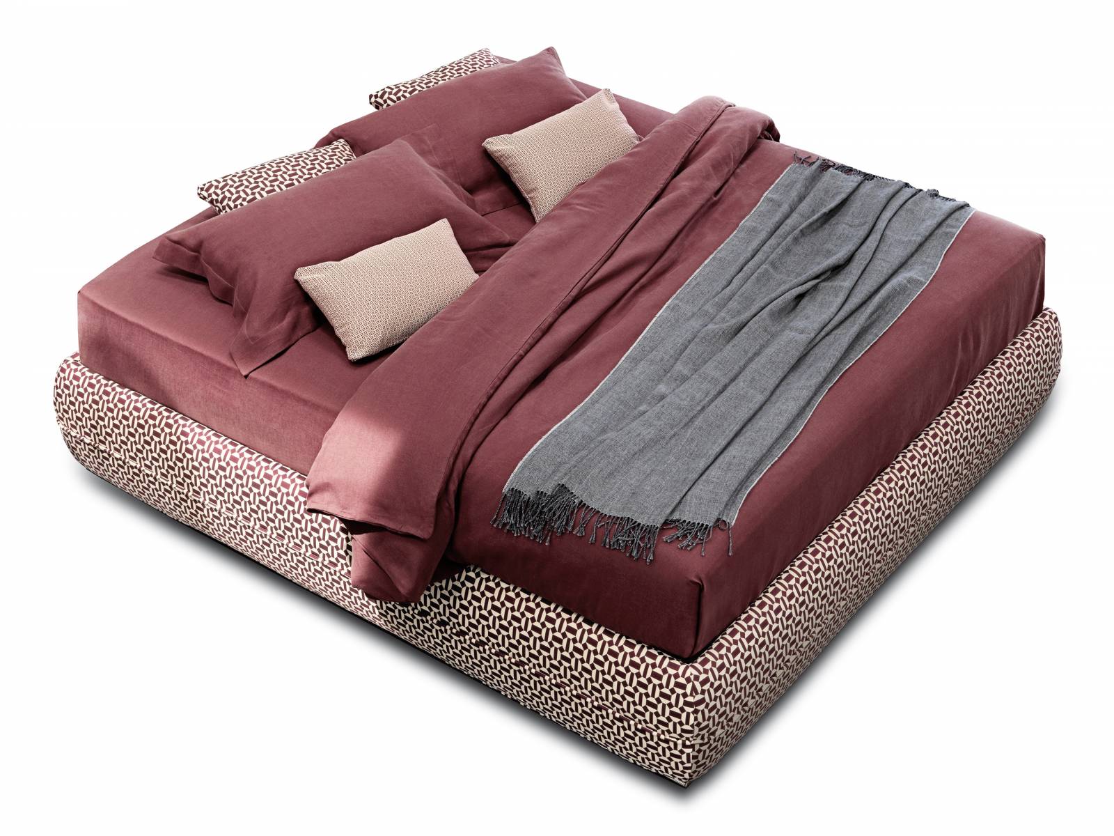 Wie auf einer Insel fühlt man sich auf dem Bett «Mandarine», das mit seinem orientalisch anmutenden Muster ein Blickfang im Raum ist. Für noch mehr Gemütlichkeit gibt es auch ein passendes, hohes Kopfteil dazu. Design: Emanuela Garbin/Mario Dell’Orto. Flou.