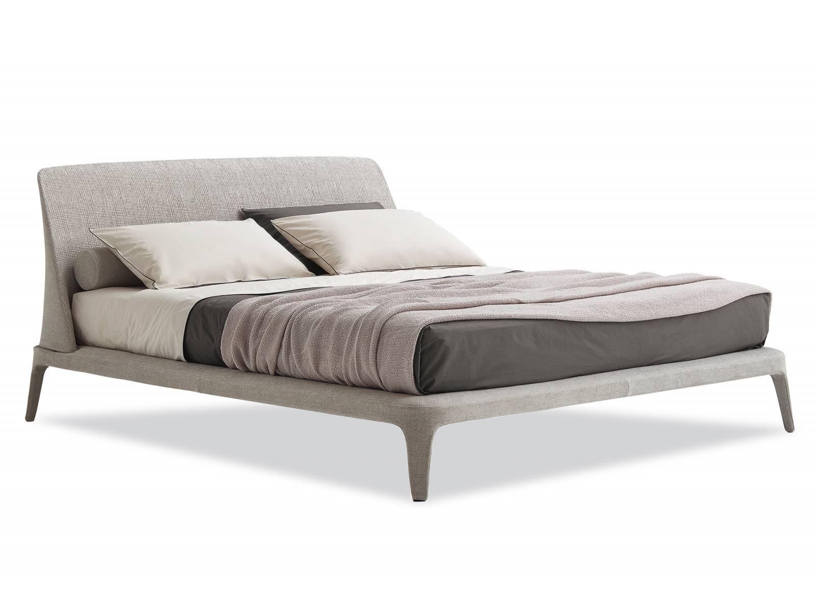 Das Erfolgsmodell «Kelly» von Emmanuel Gallina gibt es in einer neuen Version: Das Bettgestell ist vollständig mit einem Stoff bezogen, was die Weichheit der Silhouette noch betont. Poliform.