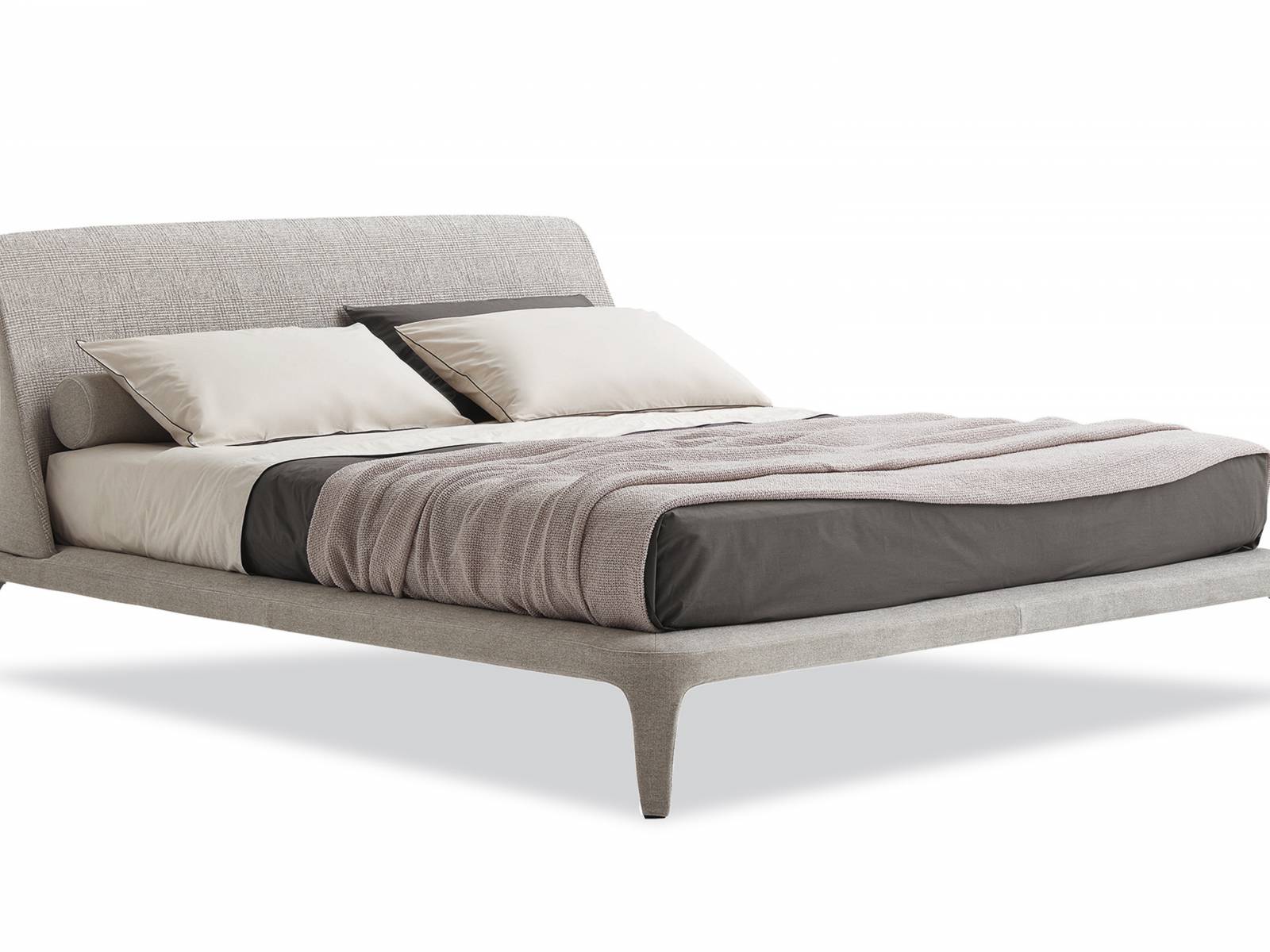 Das Erfolgsmodell «Kelly» von Emmanuel Gallina gibt es in einer neuen Version: Das Bettgestell ist vollständig mit einem Stoff bezogen, was die Weichheit der Silhouette noch betont. Poliform.