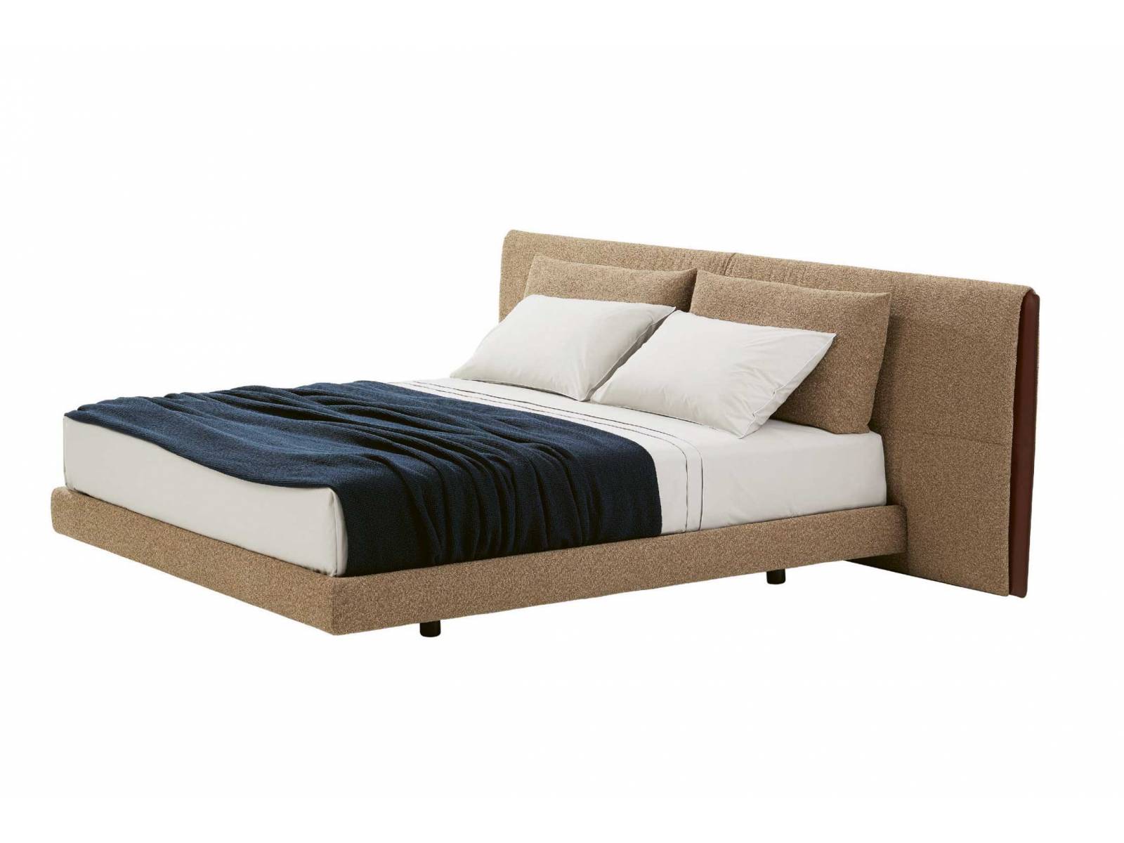 Jean-Marie Maussaud hat mit «Yume» ein edles Bett entworfen, das zeitlose Eleganz mit von der Mode inspirierten Details verbindet. So fallen beim Betrachten die Ledereinsätze am gepolsterten Kopfteil als designgebendes Element auf. POLIFORM.