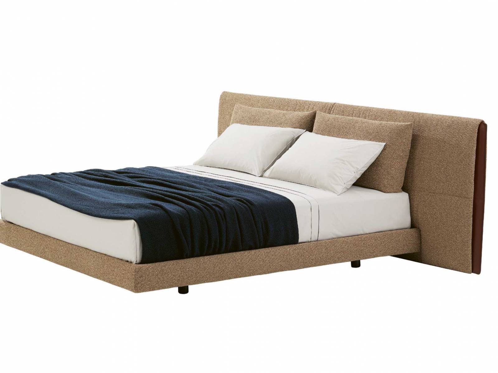 Jean-Marie Maussaud hat mit «Yume» ein edles Bett entworfen, das zeitlose Eleganz mit von der Mode inspirierten Details verbindet. So fallen beim Betrachten die Ledereinsätze am gepolsterten Kopfteil als designgebendes Element auf. POLIFORM.