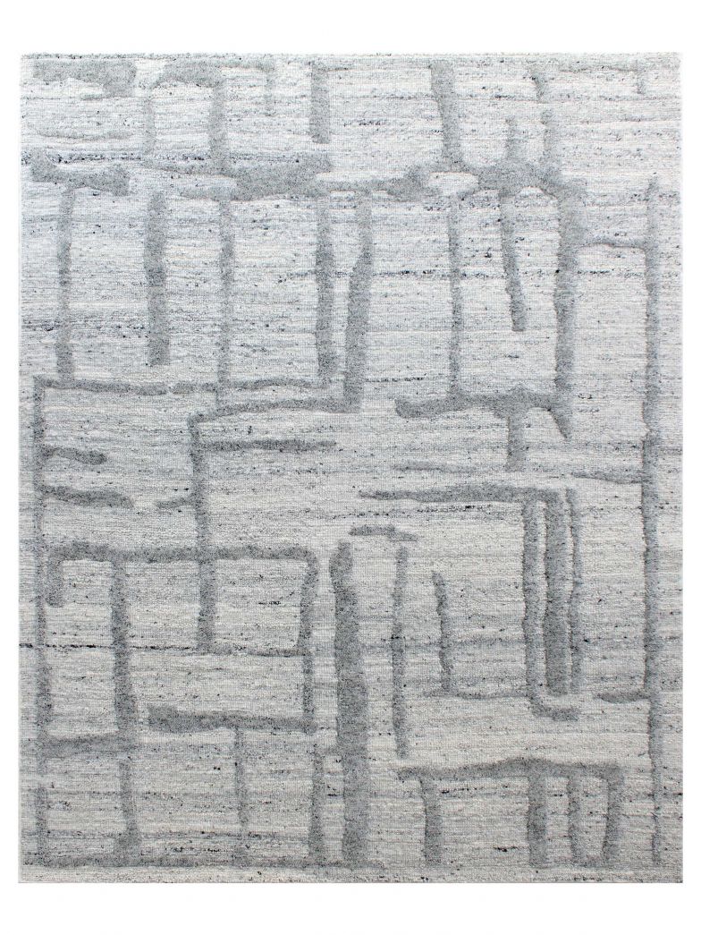 Das Familienunternehmen präsentiert gleich mehrere neue Kollektionen von handgewebten und -geknüpften Teppichen, die sich in den zurückhaltenden Farben Beige, Grau oder Elfenbeinweiss präsentieren. Dieses handgewebte Modell hier stammt aus der «Linea»-Kollektion. NEGRA.CH